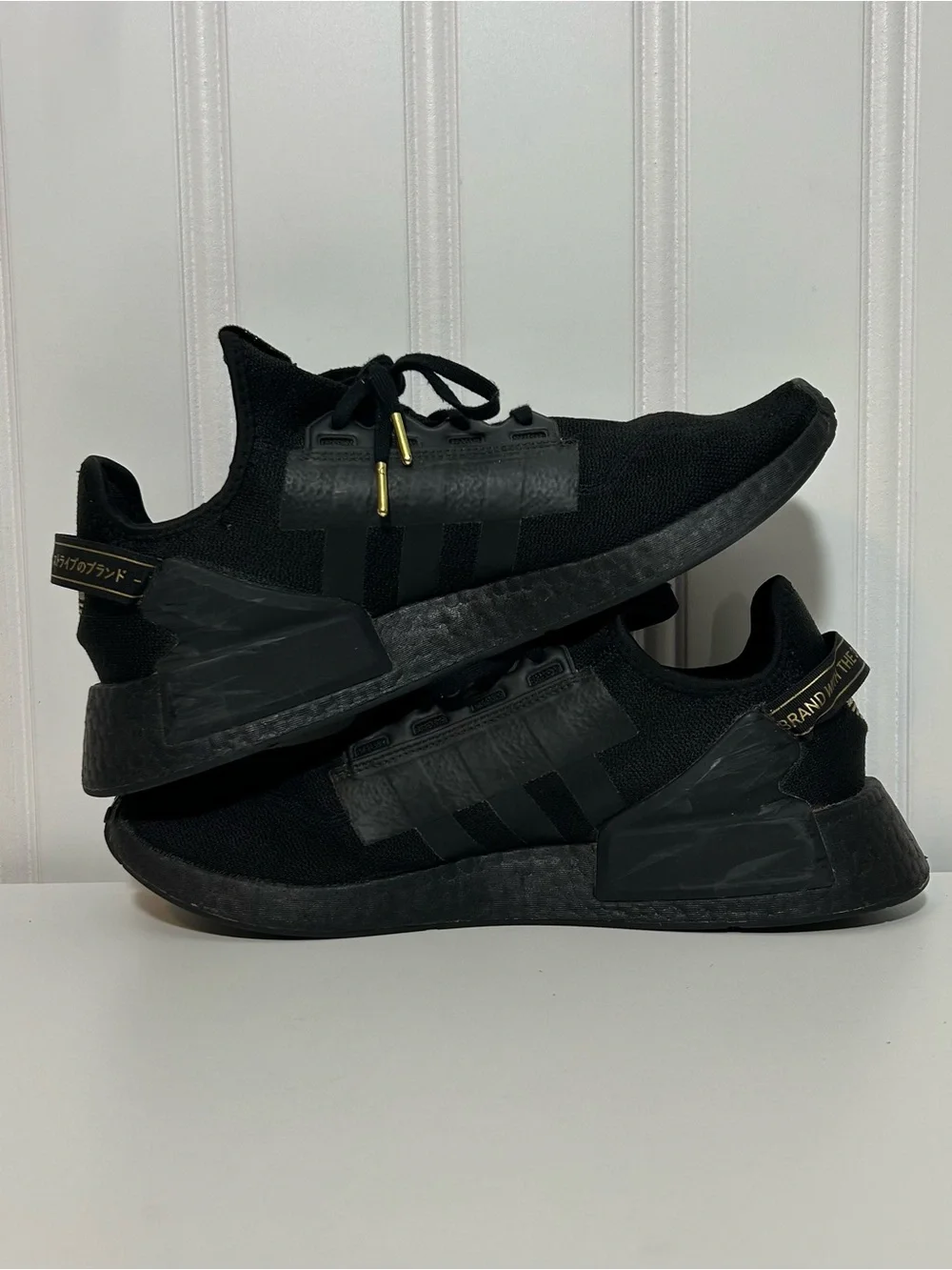 adidas nmd Black Sneakers with Gold Accents